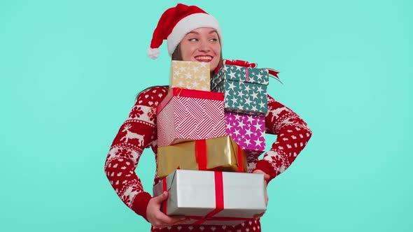 Girl in Christmas Red Sweater Santa Hat Smiling Holding Many Gift Boxes New Year Presents Shopping