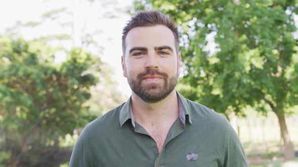 Caucasian attractive man spending time in his garden 