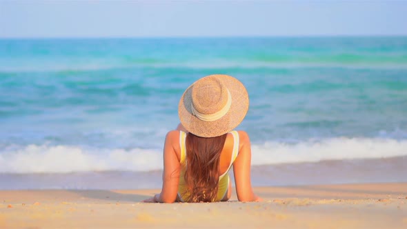 Asian woman enjoy around beautiful beach sea ocean