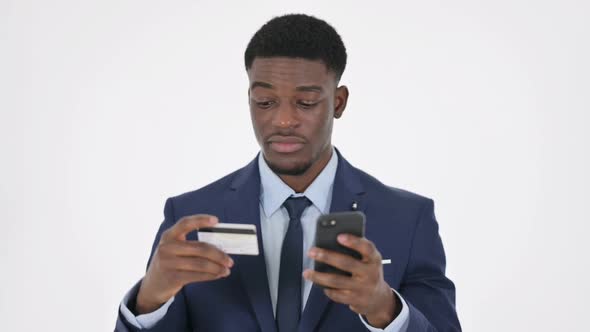 African Businessman with Successful Online Shopping on Smartphone on White Background