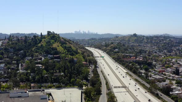 Beautiful aerial view to the cars driving on multi-level highway in Los Angeles. 