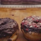 Male and Female Hands Taking All the Donuts from a Plate - VideoHive Item for Sale