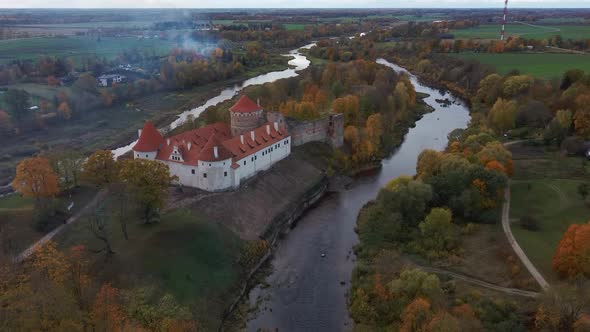 Bauska Medieval Castle Ruins Complex and Park From Above Aerial Shot 4K Video