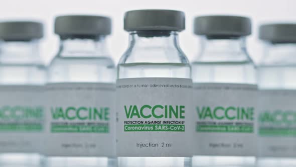 Flasks of Vaccine for COVID19 Coronavirus Cure are in Research Lab Before Injection