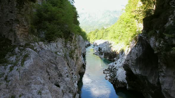 The Soča River in Slovenia, part of the Triglav National Park, has an emerald green color, and is on