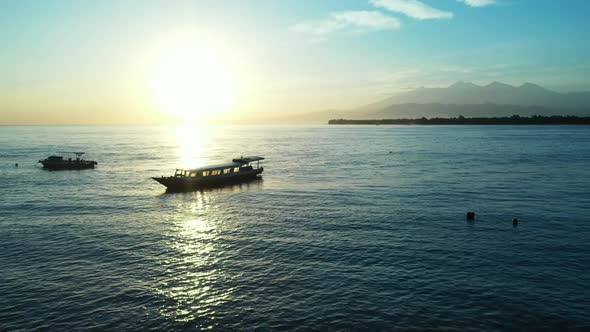 Aerial travel of exotic lagoon beach break by aqua blue ocean with white sand background of adventur