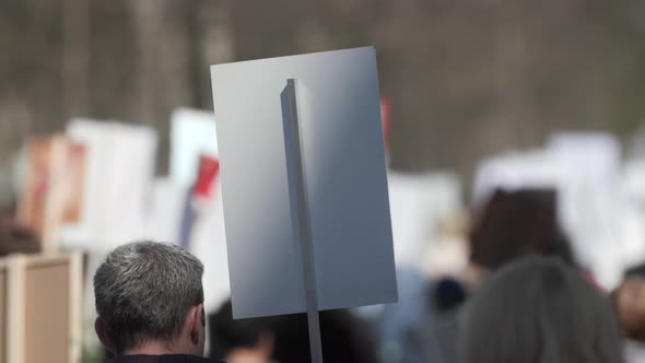 A Crowd of Demonstrators Walking Agitating on Strike Against the Government