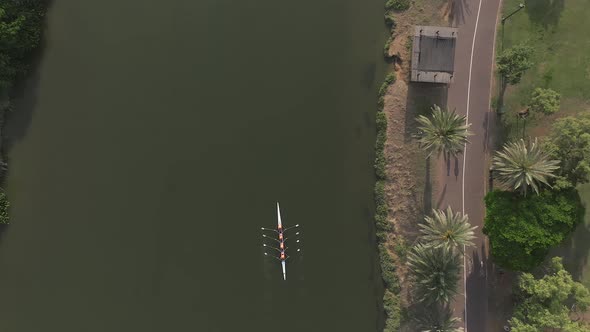 Sport canoe team rowing in a river, Drone footage.