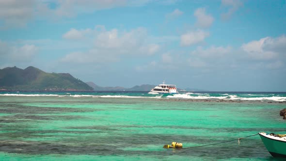 Ferry Sailing Towards Praslin Island From La Digue Island in Seychelles