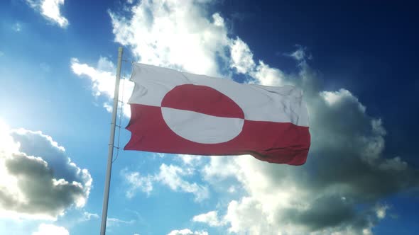 Flag of Greenland Waving at Wind Against Beautiful Blue Sky
