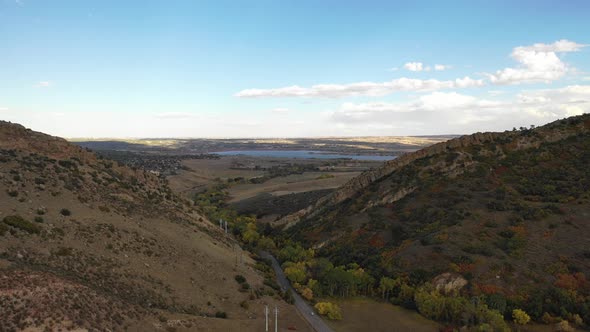 A pan over deer creek, Littleton Colorado as the fall colors start to apprea