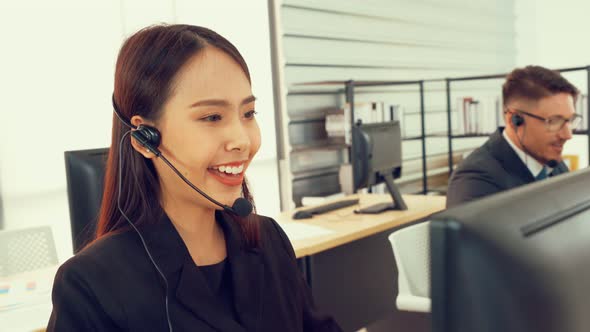 Business People Wearing Headset Working in Office