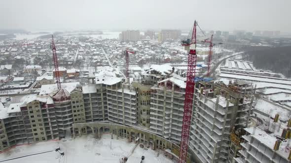 Cranes on Construction Site in Winter