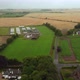 Drone View of the Farmland and the Caravan of Farm Workers - VideoHive Item for Sale