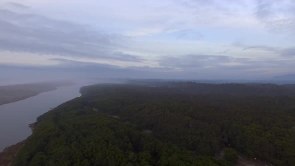 Drone aerial video of New River in Oregon. Running parallel to the Pacific Ocean for nine miles, thi