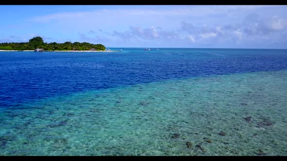 Aerial flying over seascape of tropical bay beach trip by turquoise sea and white sand background of