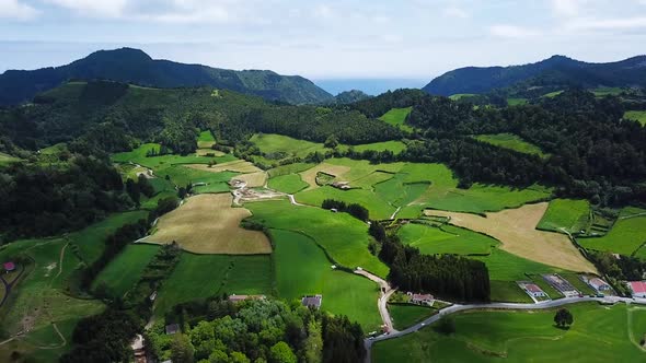 Aerial Shot above Greenish Agriculture area in Sao Miguel Island, Azores. Portugal