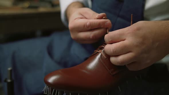 Shoe Maker Tied Shoes, Master, Craftsman, Workman Is Manufacture, Produce, Make Shoes in Small
