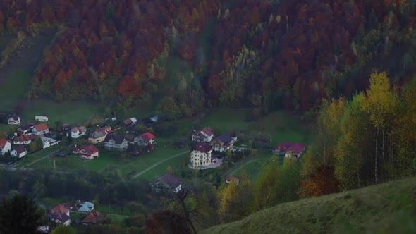 Peaceful Village By Autumn Forest Landscape Of Hills Under Sunny Sky In Piatra Craiului, Brasov Coun