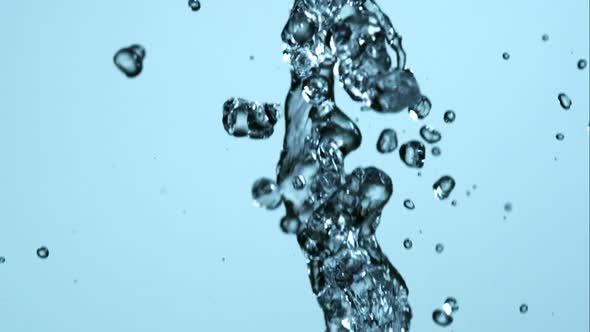 Water pouring and splashing in ultra slow motion 1500fps on a reflective surface - WATER POURS  alt