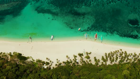 Tropical Beach and Turquoise Lagoon Water