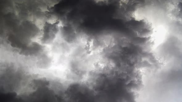 thunderstorm, dark clouds moving in the sky with lightning flashing