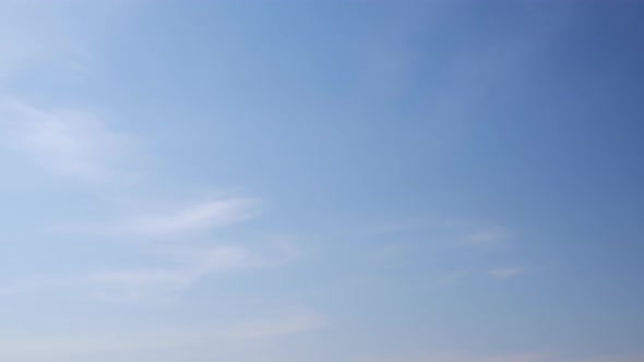 4K Time lapse of beautiful blue sky with clouds background, Blue sky with clouds and sun.