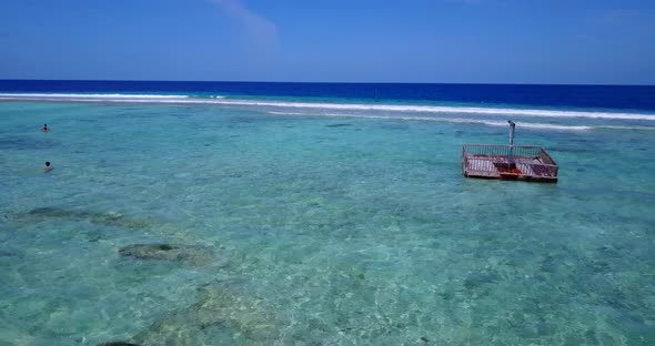 Wide flying abstract view of a summer white paradise sand beach and blue sea background in colourful