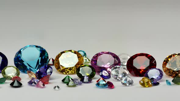 Colorful Diamonds Of Various Sizes Arranged On A White Background