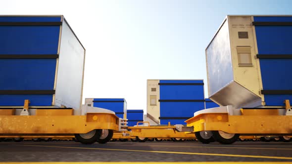 Containers On Airport Cargo Trailers. Seamless looping shot. Freight transport.