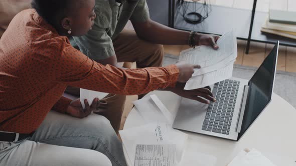 Family Couple Doing Paperwork at Home