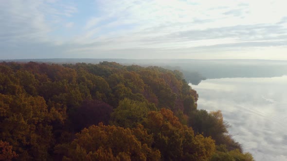 landscape river near the hills. autumn, morning, fog. Aerial view.