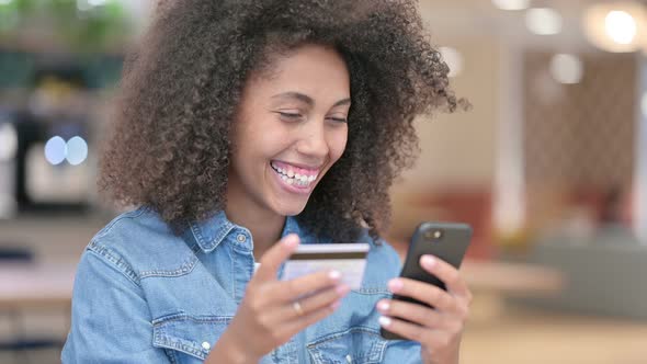 African Woman Excited for Online Shopping, Smartphone 