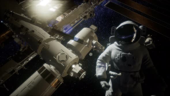 Astronaut Outside the International Space Station on a Spacewalk alt