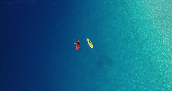 Adventurous couple kayaking together