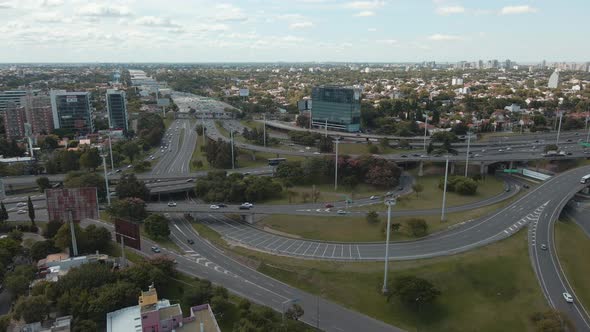 Aerial view of Panamericana highway and General Paz avenue interchange with commuters