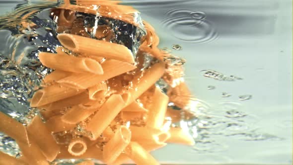 The Pasta Falls Into the Water with Air Bubbles