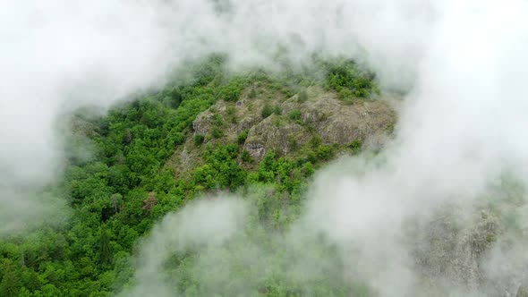Clouds Over Green Mountain Forest at Summer Beautiful Nature Aerial Landscape with Morning Mist Fog