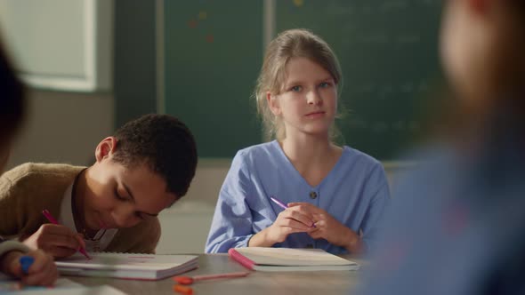 Clever Schoolboys and Schoolgirls Studying Science Together at School