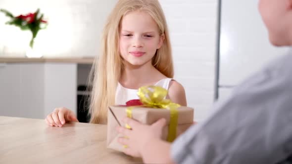 Little Boy Gives His Beloved Girl Valentines Day Gift Box
