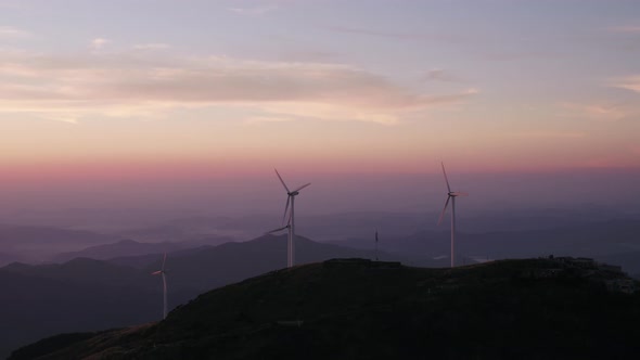 Wind Turbines in mountain during sunset