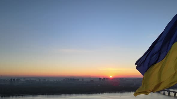 Ukrainian Flag in the Morning at Dawn. Aerial. Kyiv. Ukraine