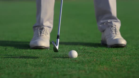 Athlete Legs Play Golf Game on Green Game Field