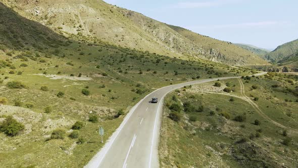 Top View of a Passenger Car That is Driving on a Mountain Road in Turkey