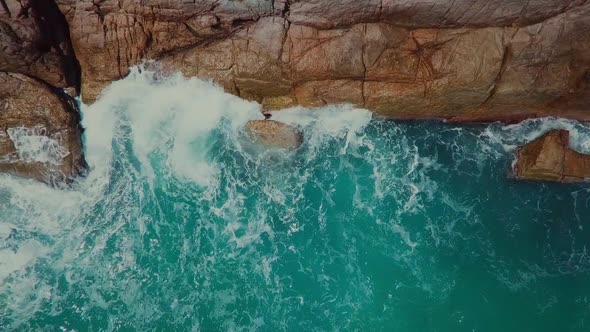 Raging Sea and Rocks Top View