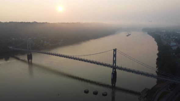 View of the Simon Kenton Memorial Bridge at Maysville, Kentucky on a foggy morning.  Aerial Drone fo