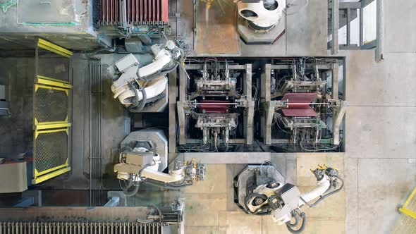 Top View of Automated Machines Bending Copper Sheets