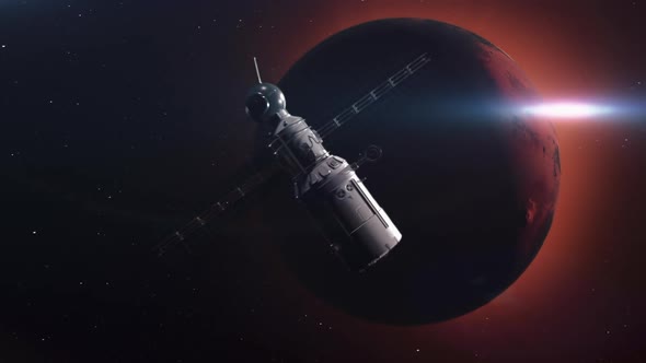 A spaceship moves in outer space to meet the planet Mars . alt