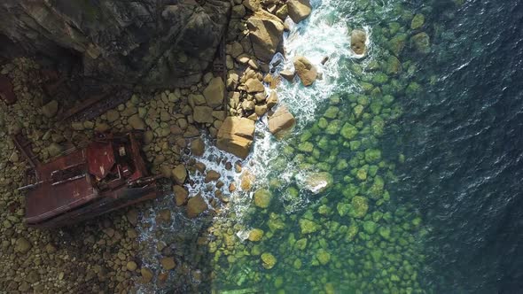 Rusty Shipwreck Of The RMS Mulheim In Land's End Cornwall England - aerial shot