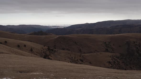 Car in the Mountains of the Caucasus in Winter